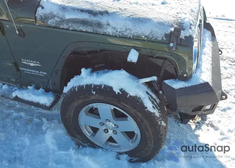 2009 Jeep Wrangler Unlimited Sahara z USA, uszkodzony, nr VIN 1J4GA59189L710032